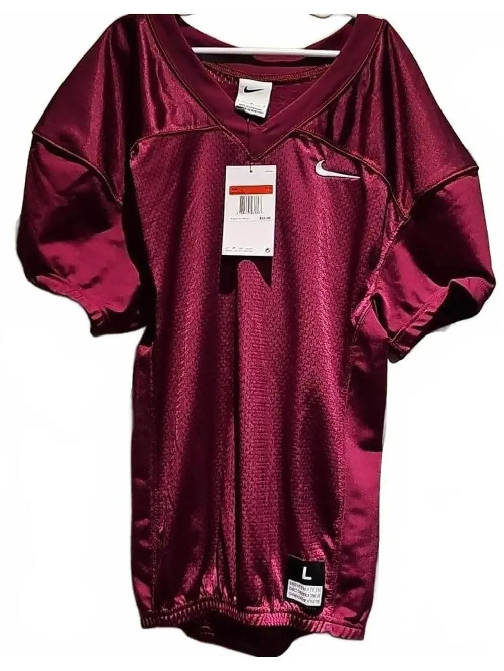 Nike football jersey size kids L. NWT